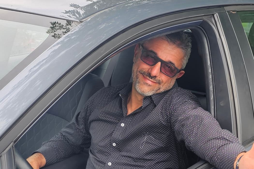Igor Isaev at the wheel of his dual-control car at Jackson's Point, Georgina